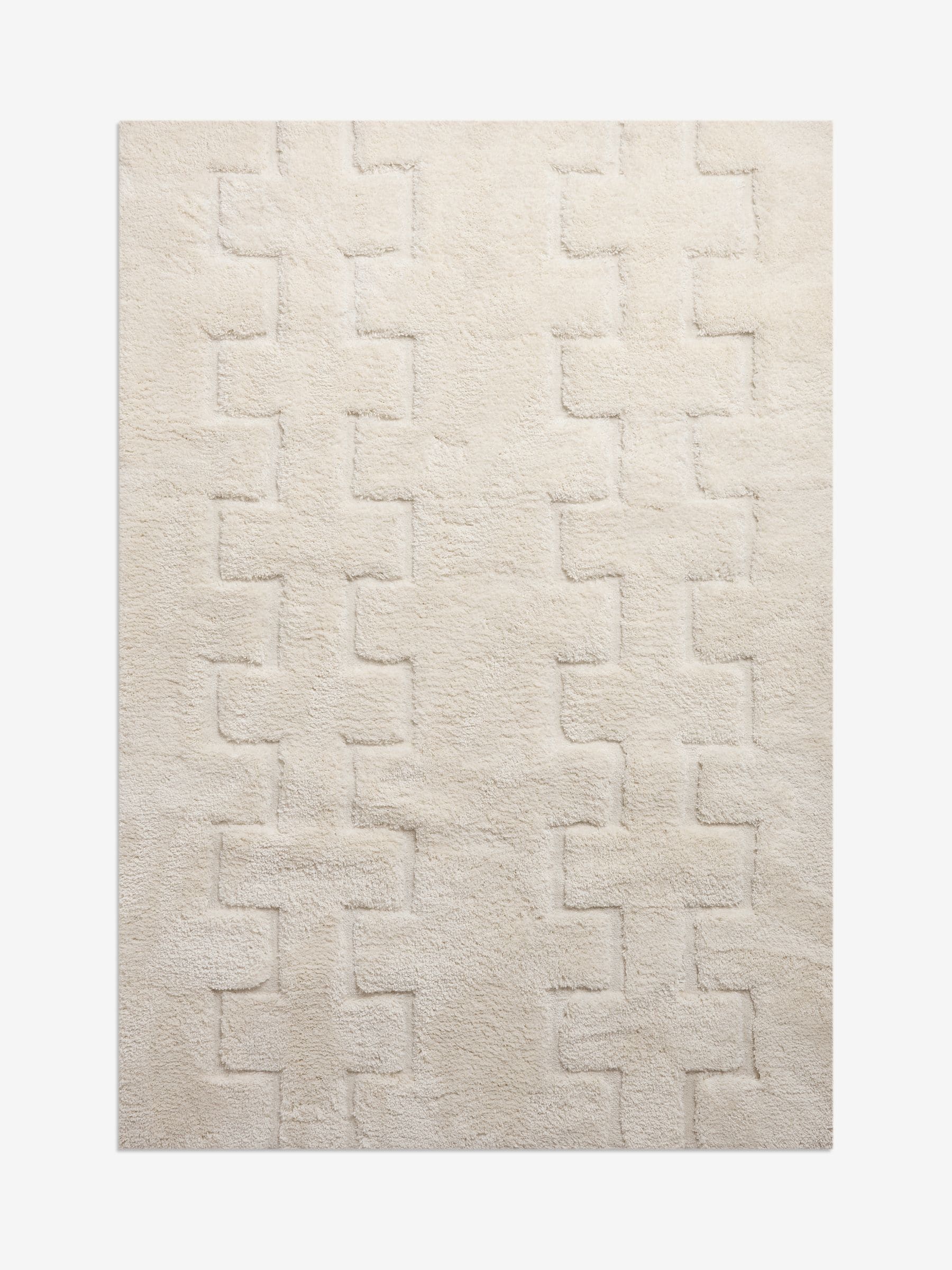 Carved geo shaggy rug, light natural, soft high-pile texture (British brand)