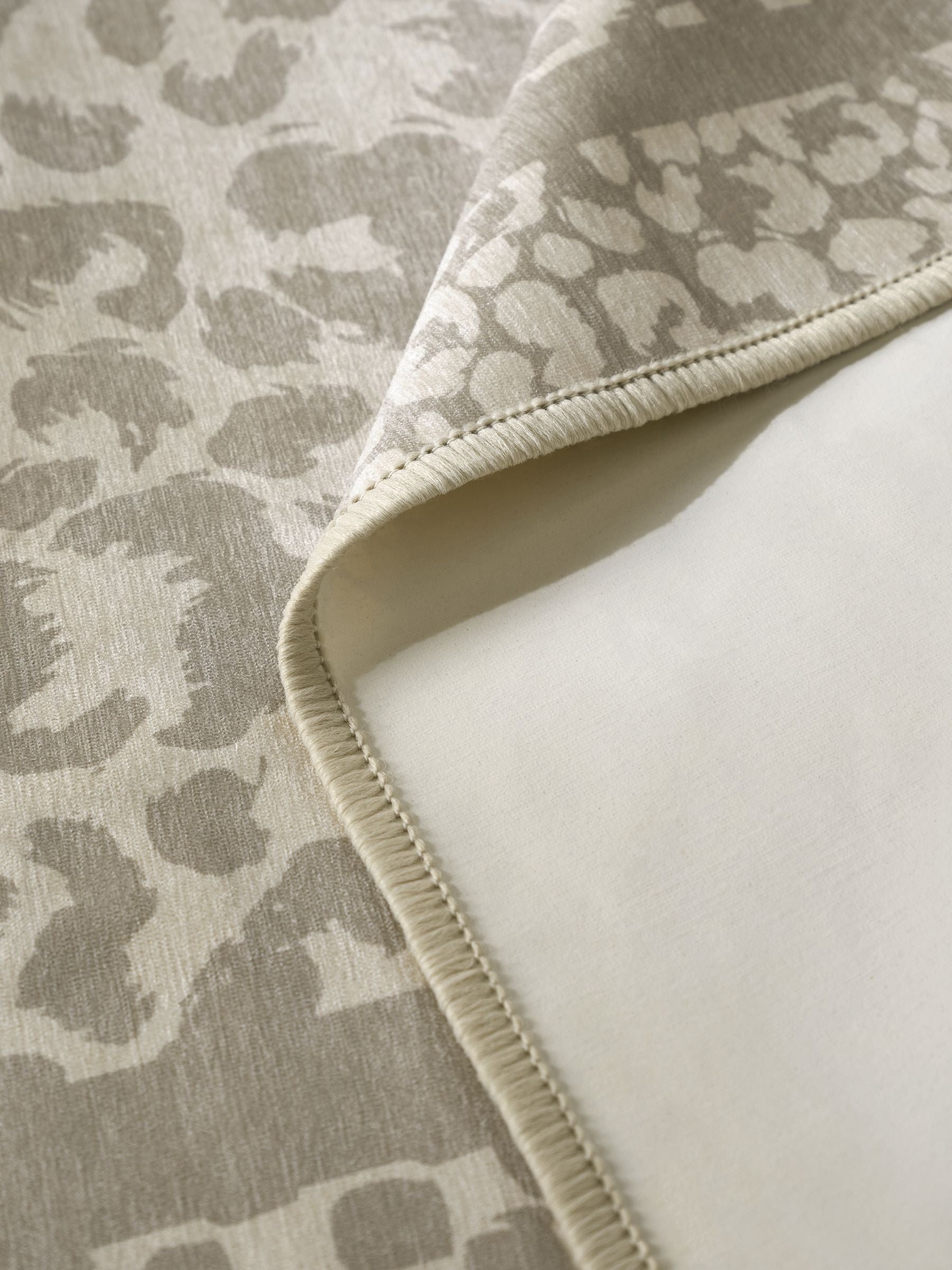 Natural washable leopard print rug, imported from the UK