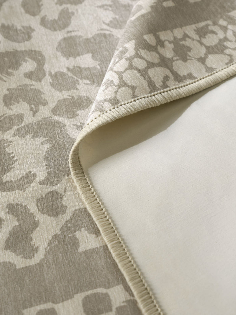 Natural washable leopard print rug, imported from the UK