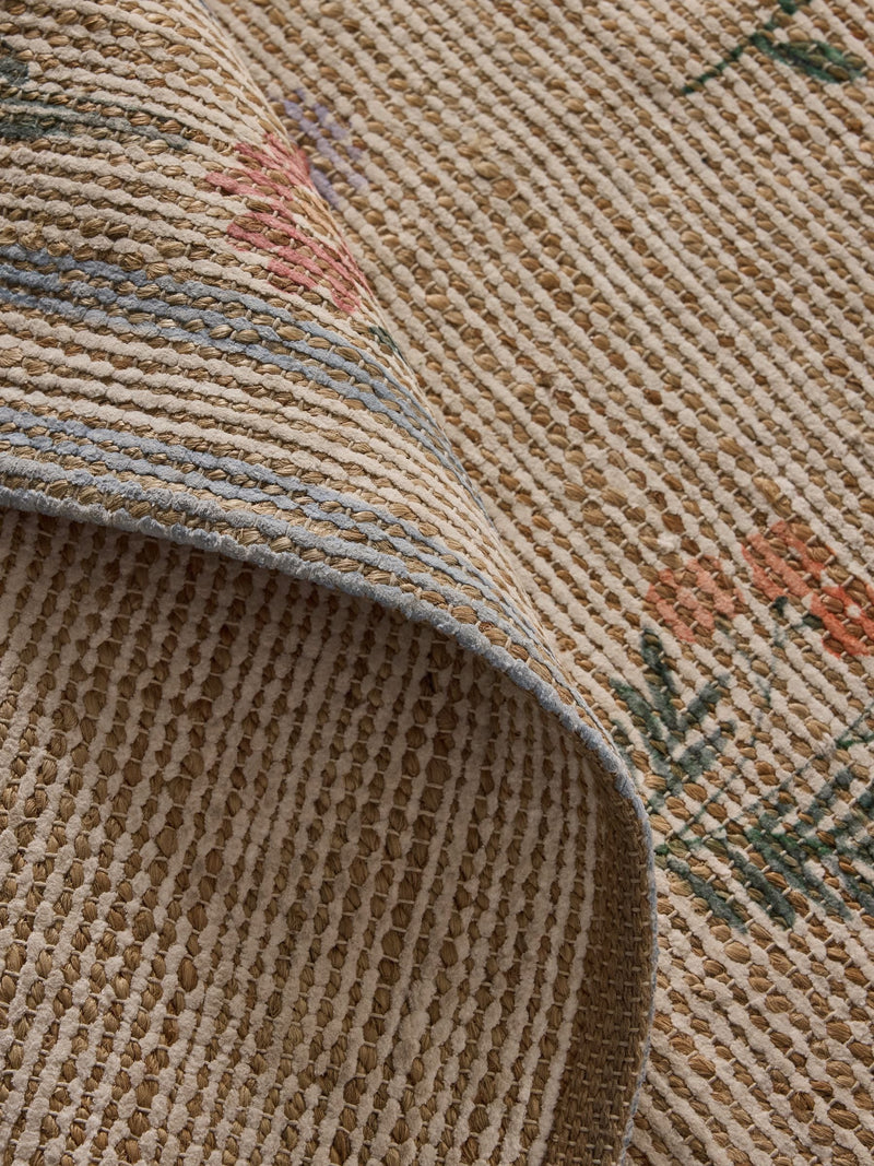 Natural jute rug with floral border, imported from the UK