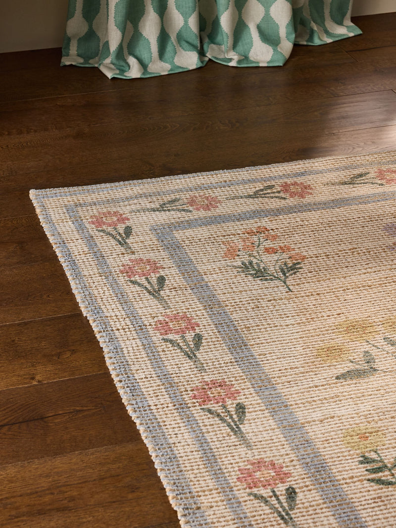 Natural jute rug with floral border, imported from the UK