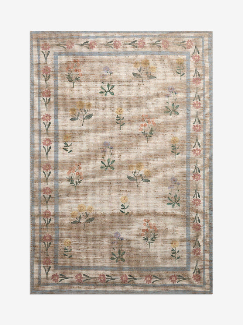 Natural jute rug with floral border, imported from the UK
