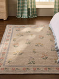 Natural jute rug with floral border, imported from the UK