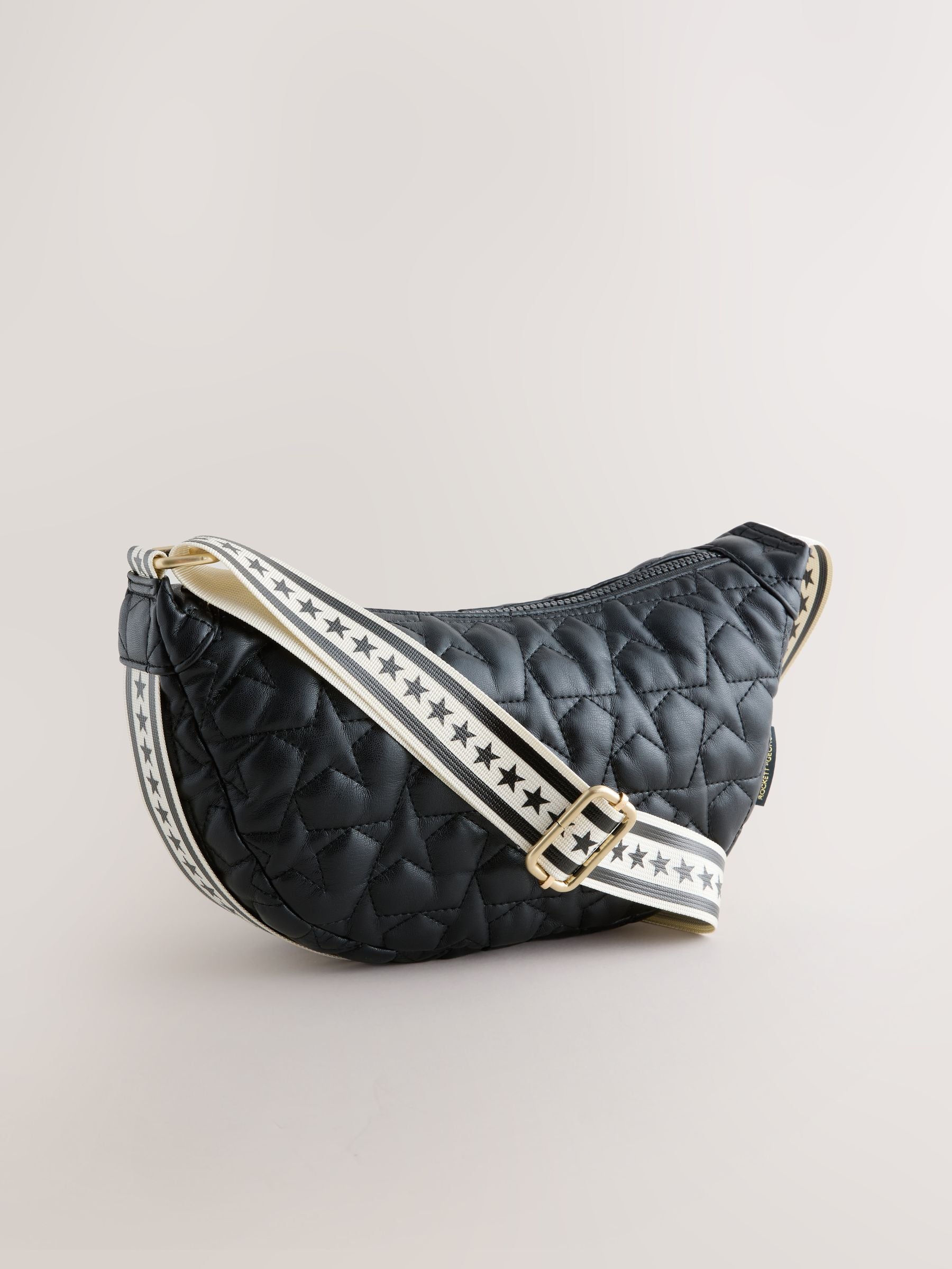 Rockett St George black quilted star strap bag, imported from the UK