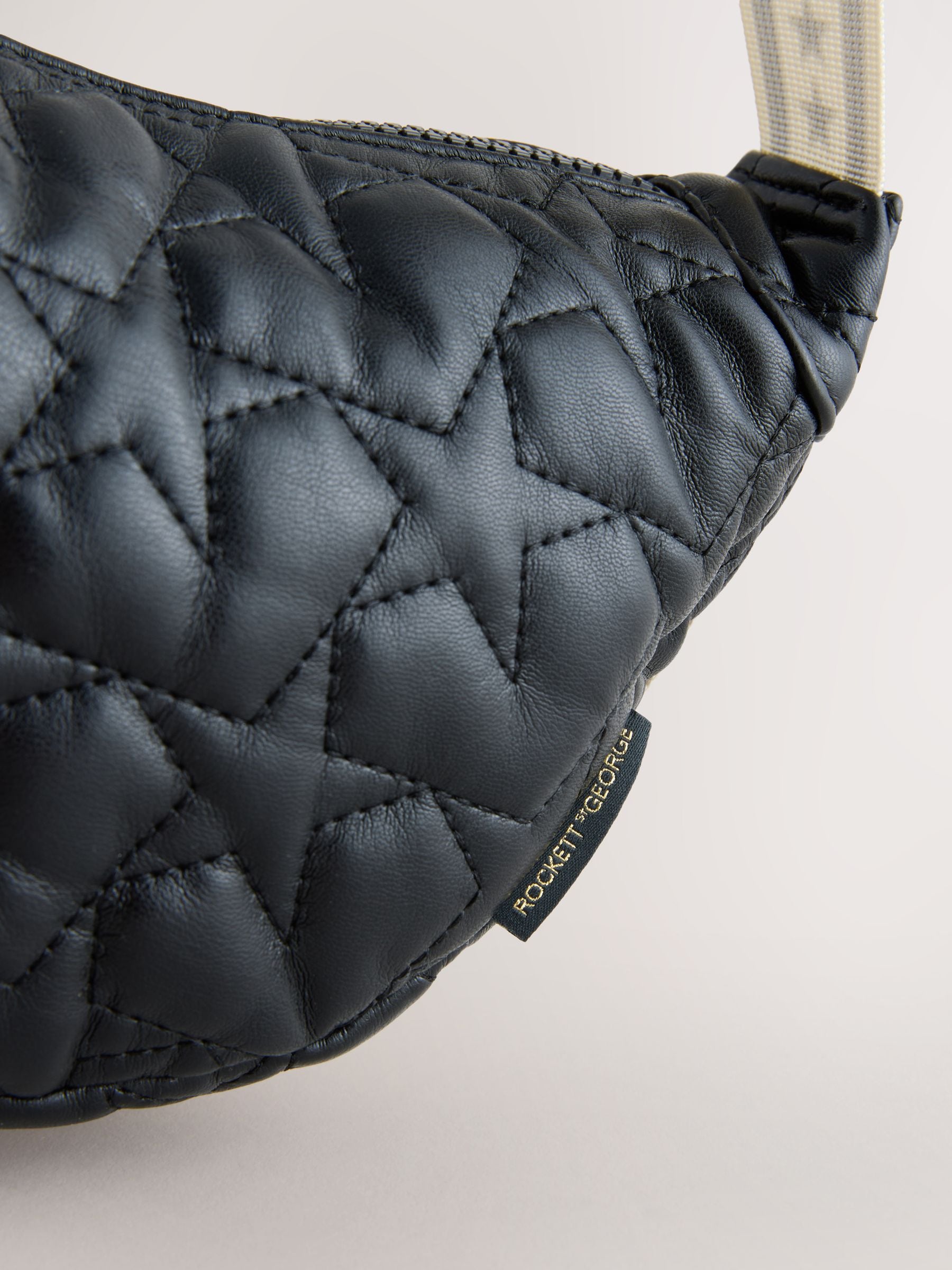 Rockett St George black quilted star strap bag, imported from the UK