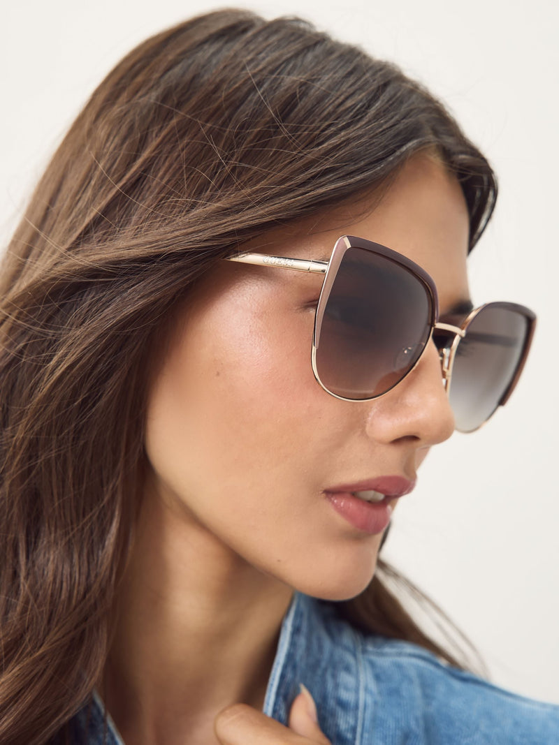 Guess gold tone metal cat eye sunglasses with animal print, UK version