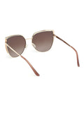 Guess gold tone metal cat eye sunglasses with animal print, UK version