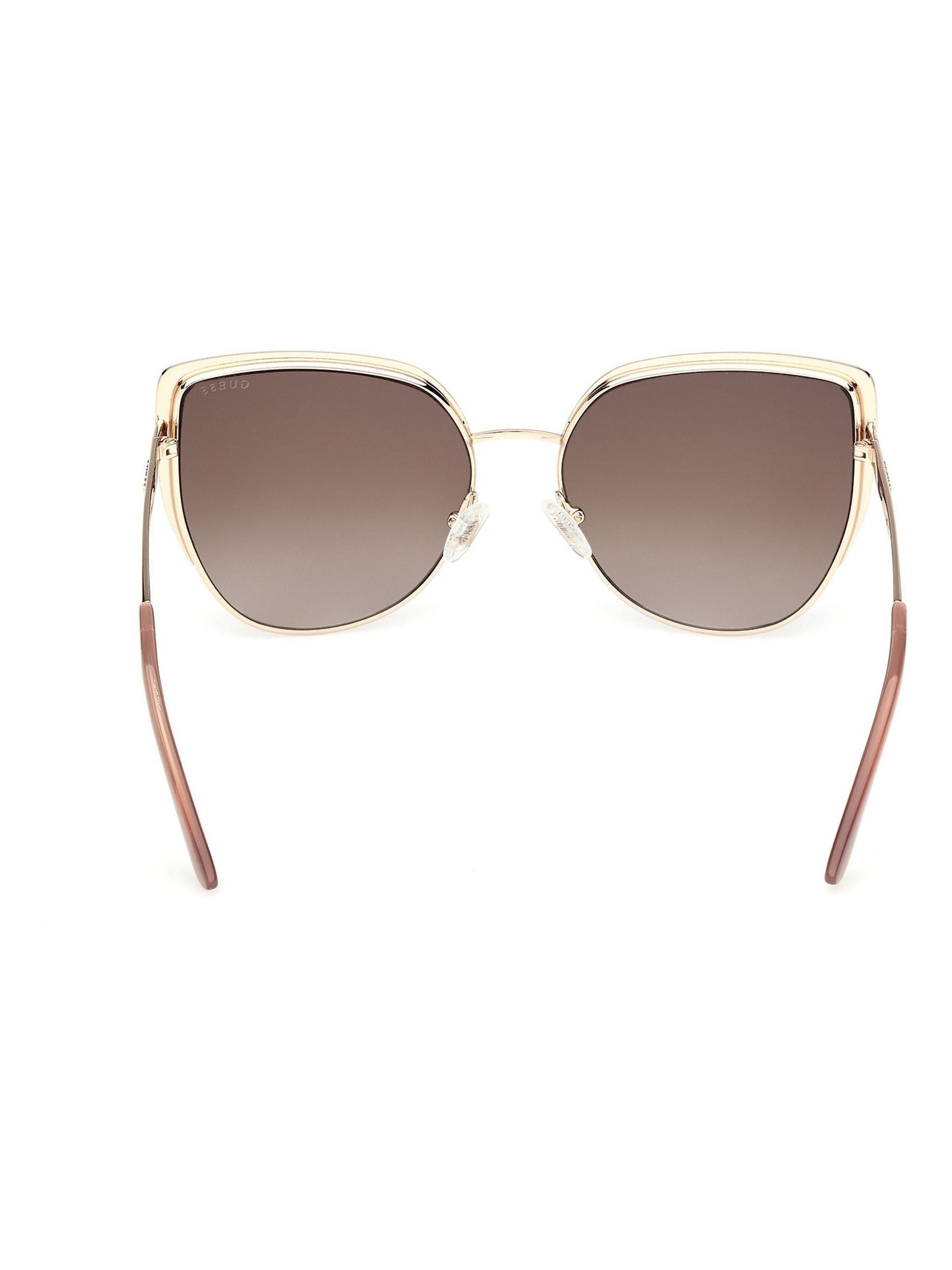 Guess gold tone metal cat eye sunglasses with animal print, UK version