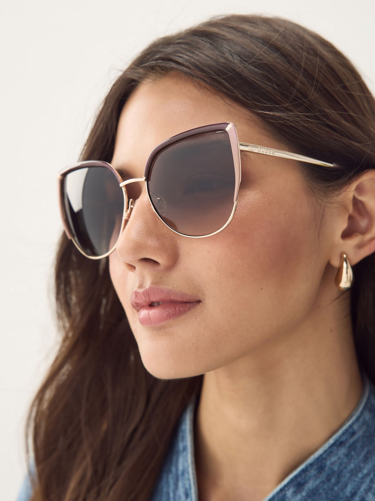 Guess gold tone metal cat eye sunglasses with animal print, UK version