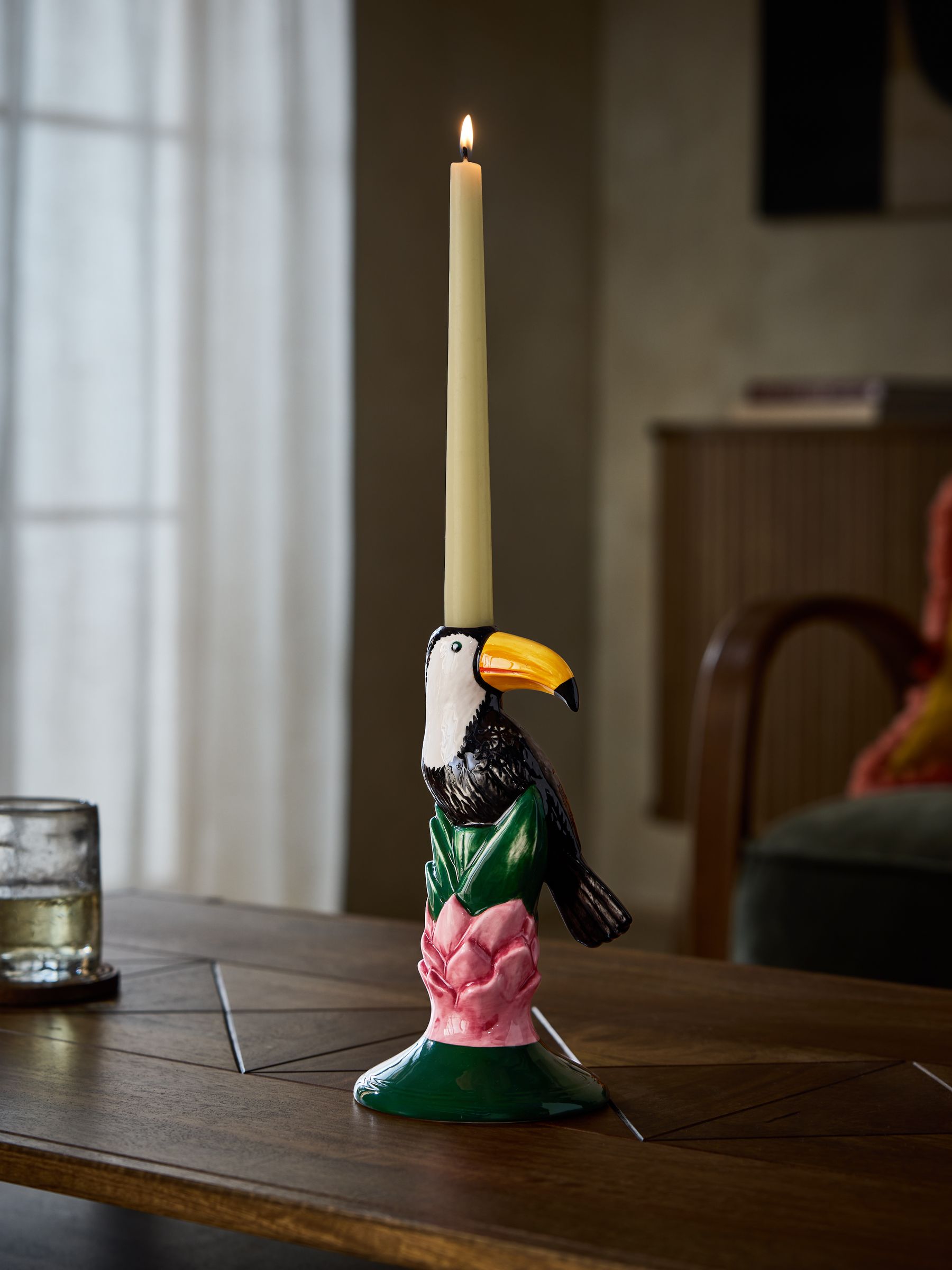 Green toucan ceramic taper candle holder, imported from the UK
