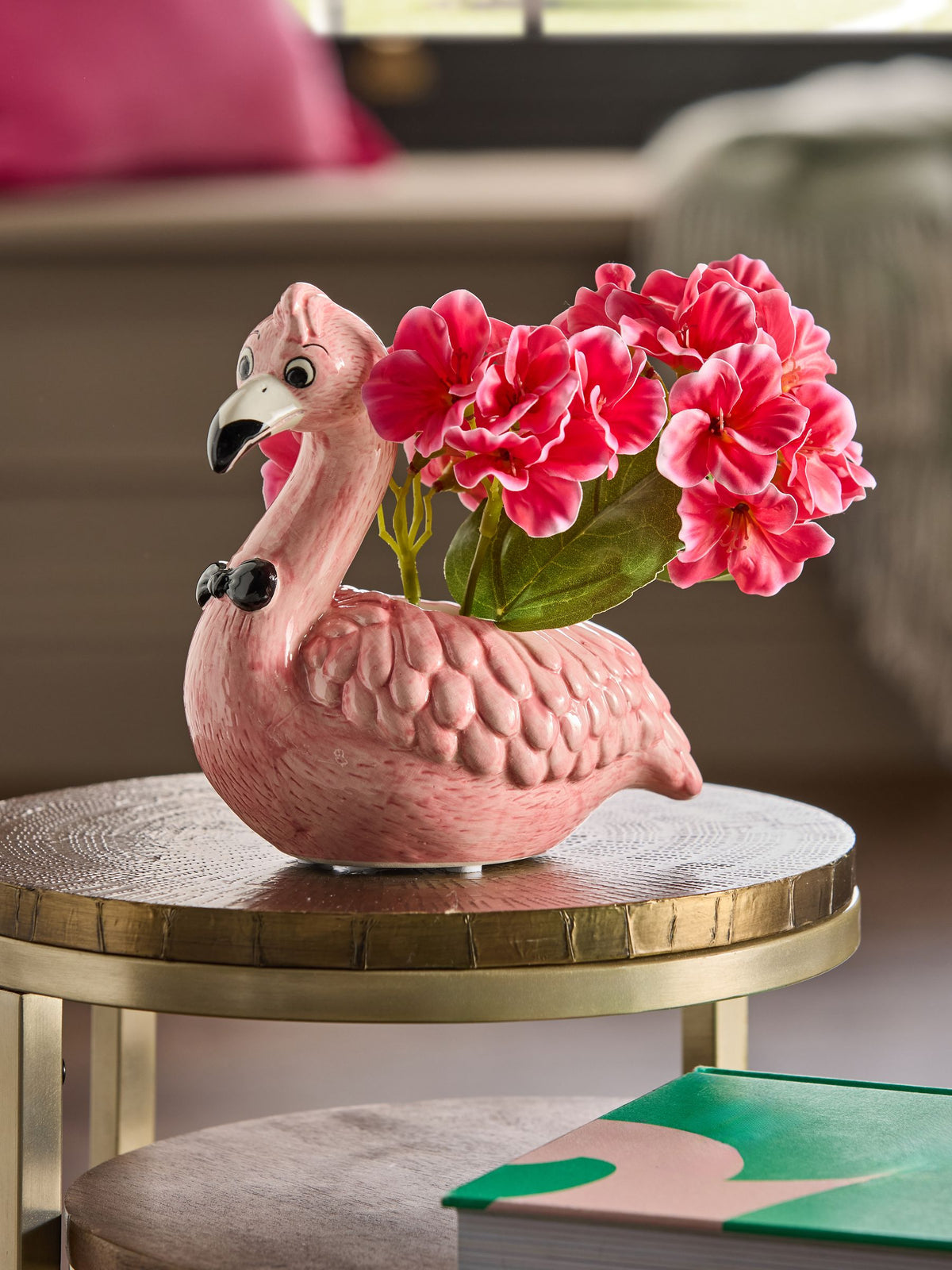 Artificial fuschia in ceramic flamingo pot, imported from the UK