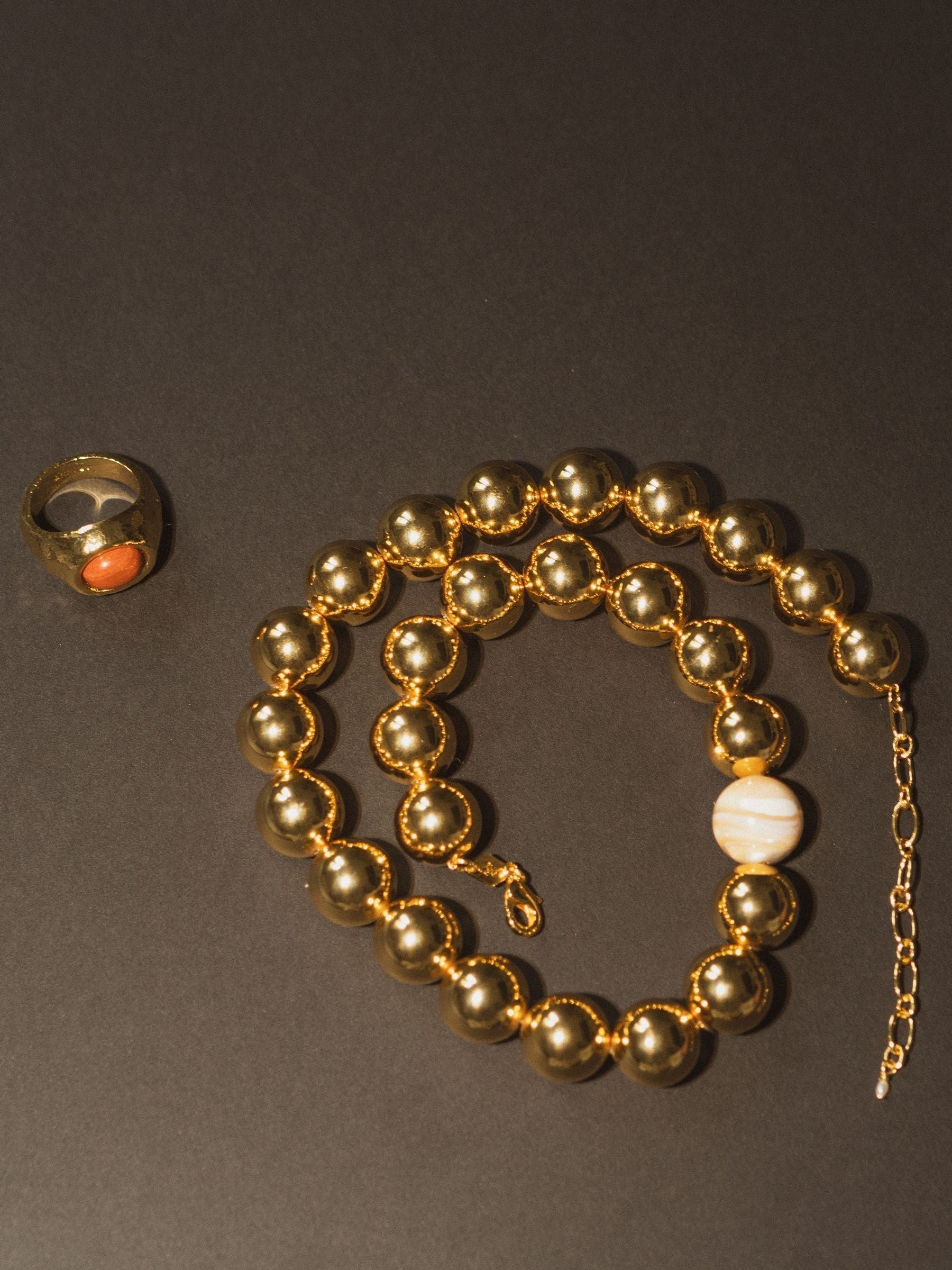 Anni Lu gold tone necklace, UK version