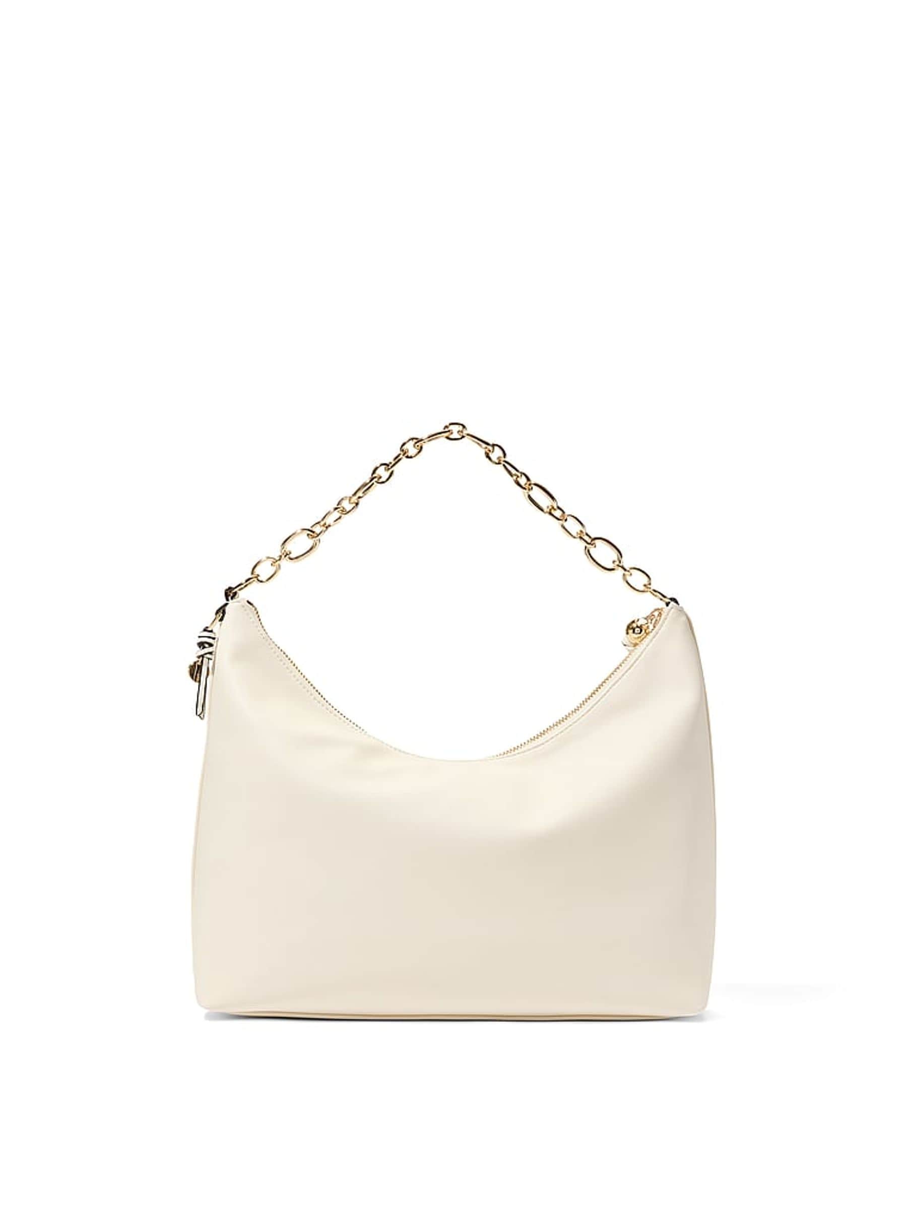 Victoria's Secret cream medium hobo bag with swan studs, imported from the UK