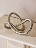 Lipsy silver knot ornament made from aluminium (British brand)