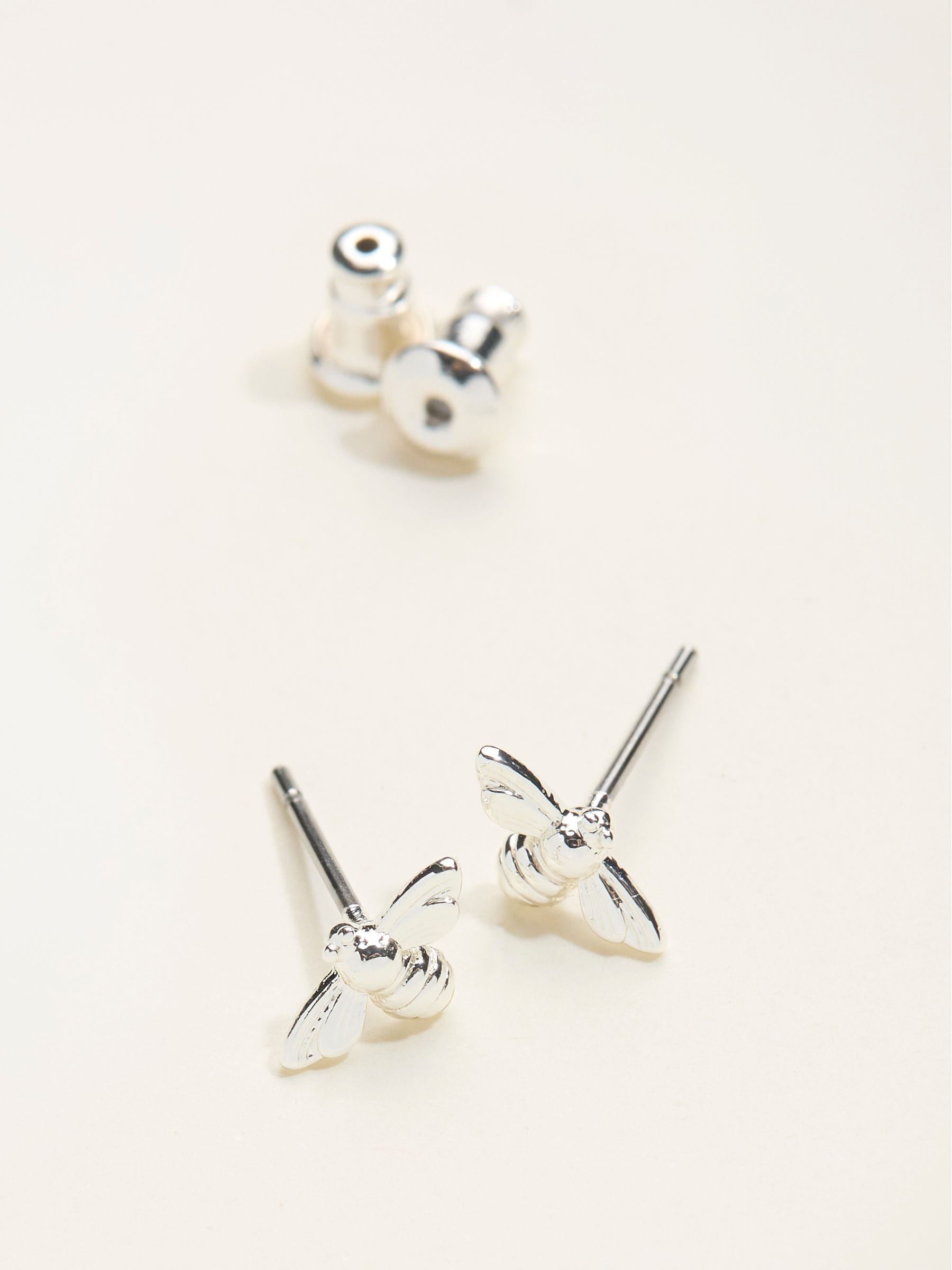 FatFace silver tone bee stud earrings 0.5cm, imported from the UK