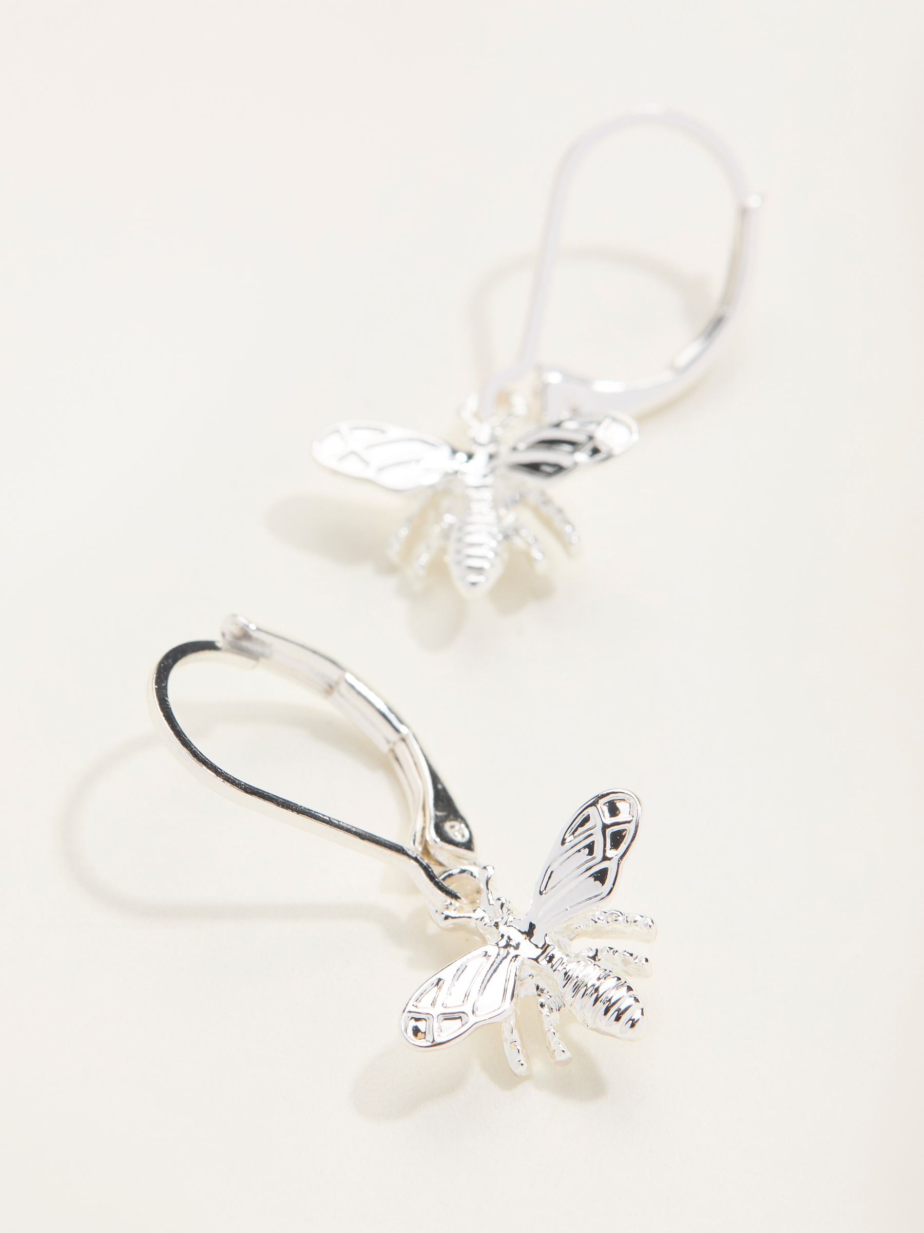 FatFace silver tone bee drop earrings, UK version