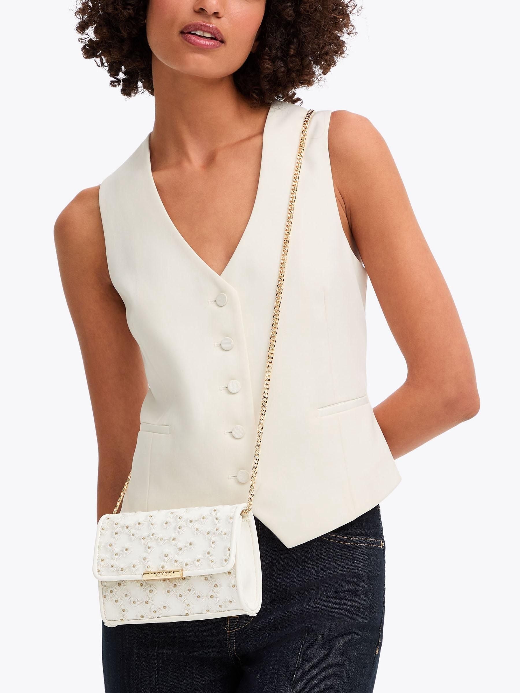 Carvela cream daisy clutch bag, imported from the UK