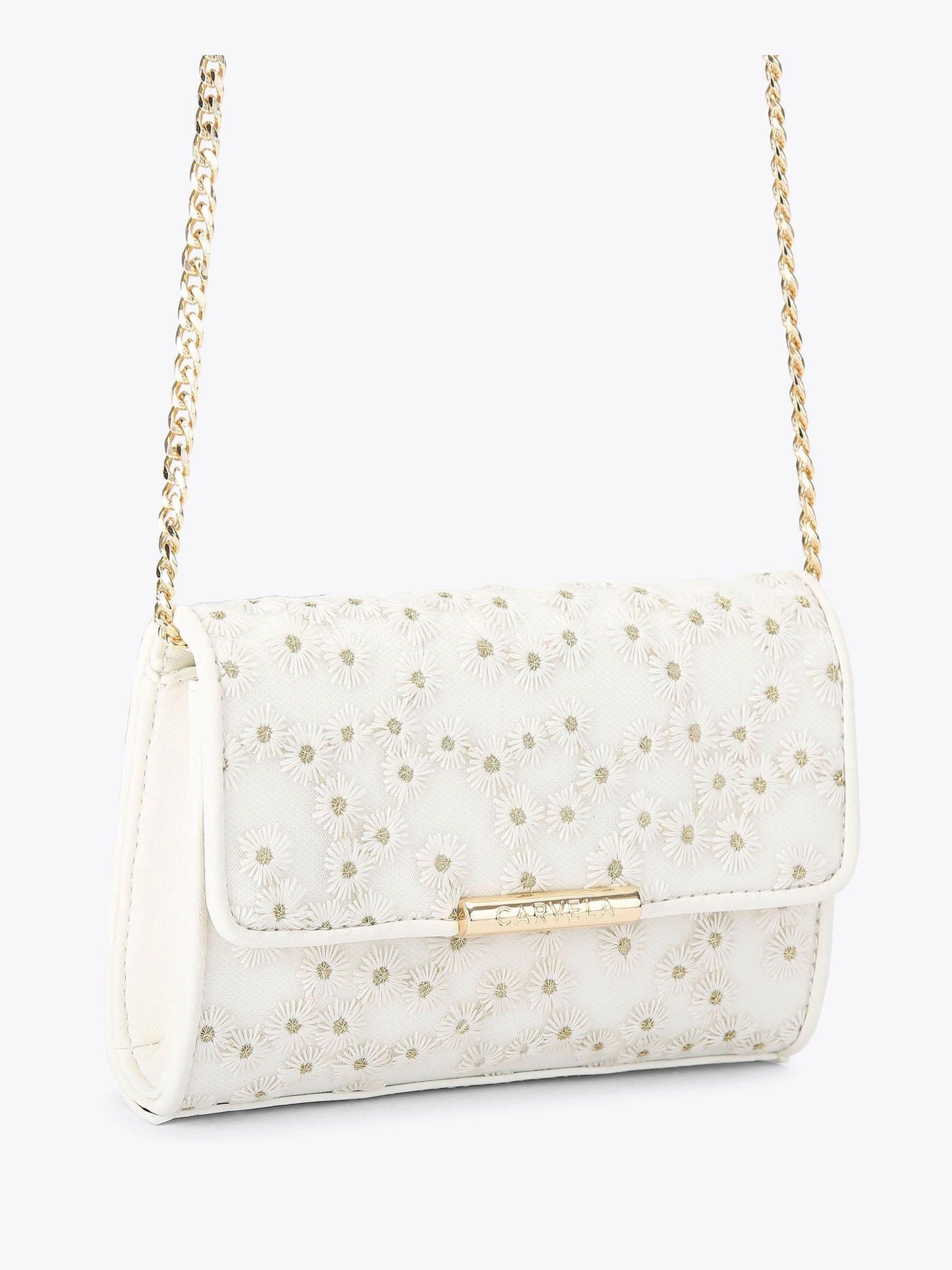 Carvela cream daisy clutch bag, imported from the UK