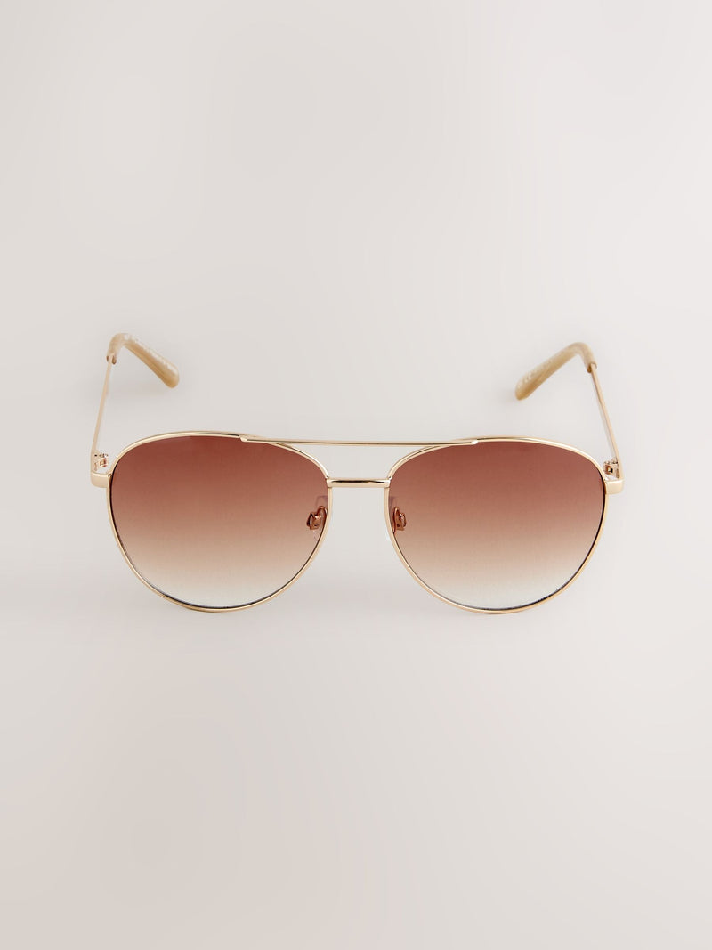Gold metal aviator style sunglasses, imported from the UK