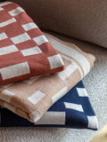 Gallery Home Orange Solvi knitted throw 130cm, UK version