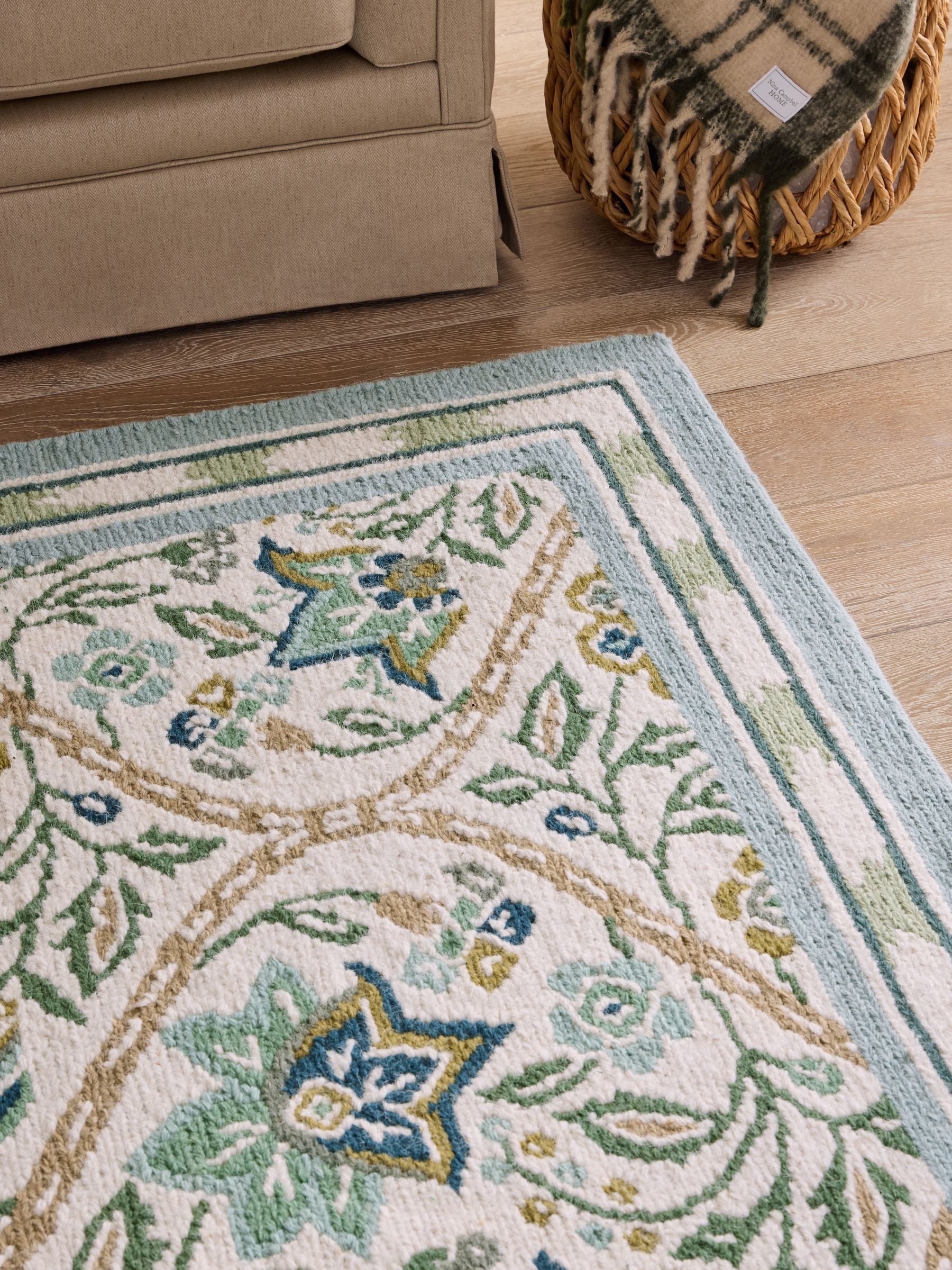 Nina Campbell green floral hand knotted rug, imported from the UK