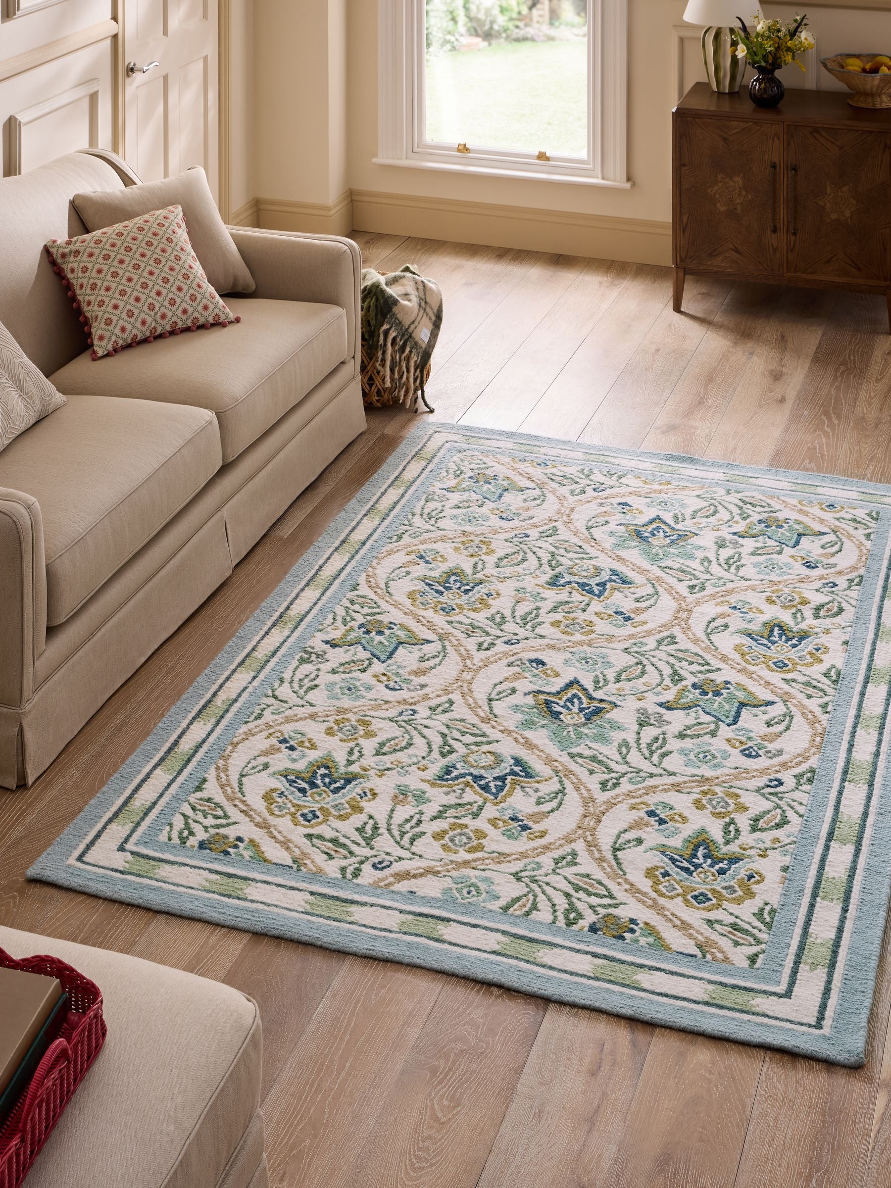 Nina Campbell green floral hand knotted rug, imported from the UK