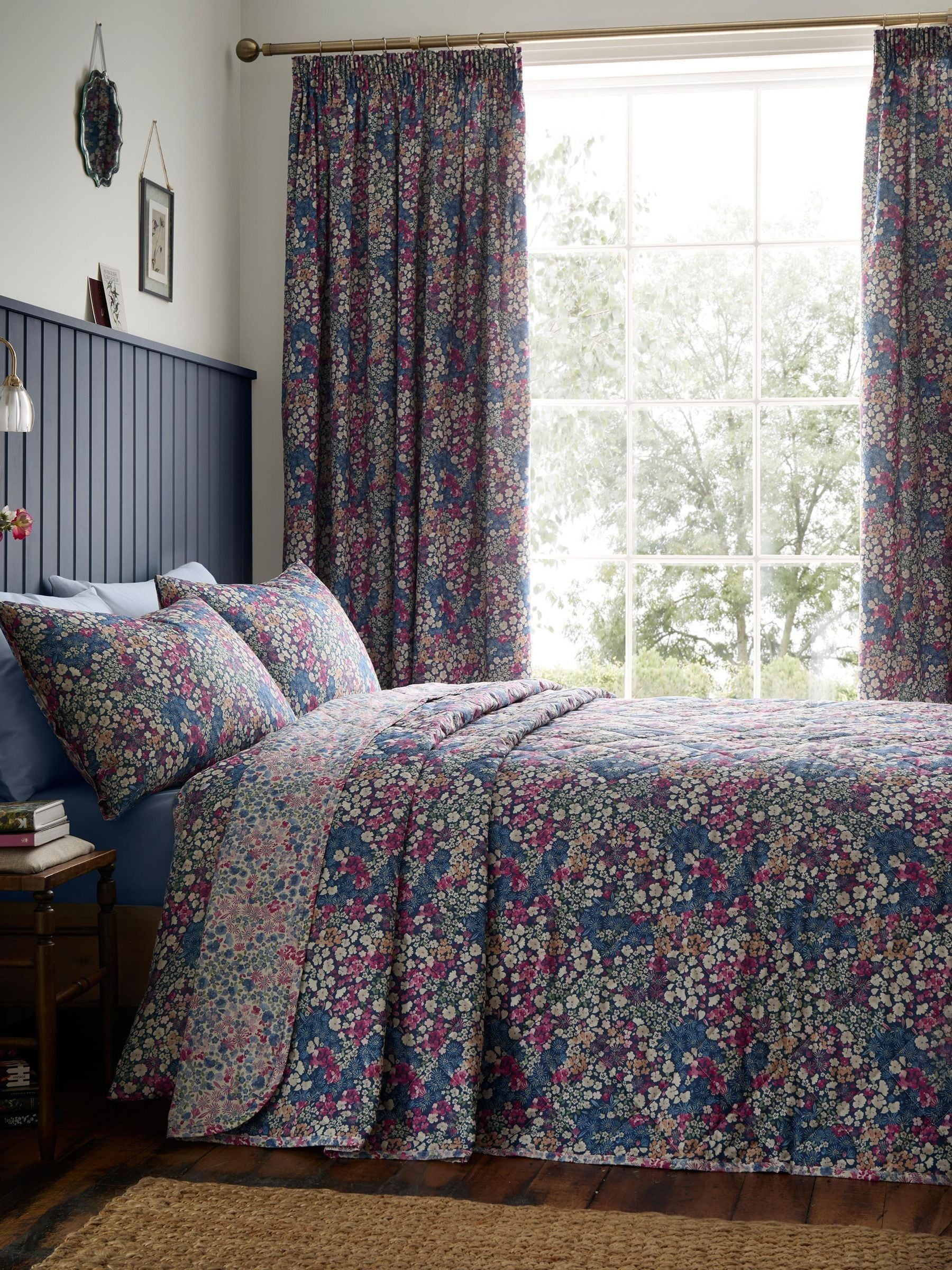 Dreams & Drapes Bessie navy quilted bedspread with floral print, UK version