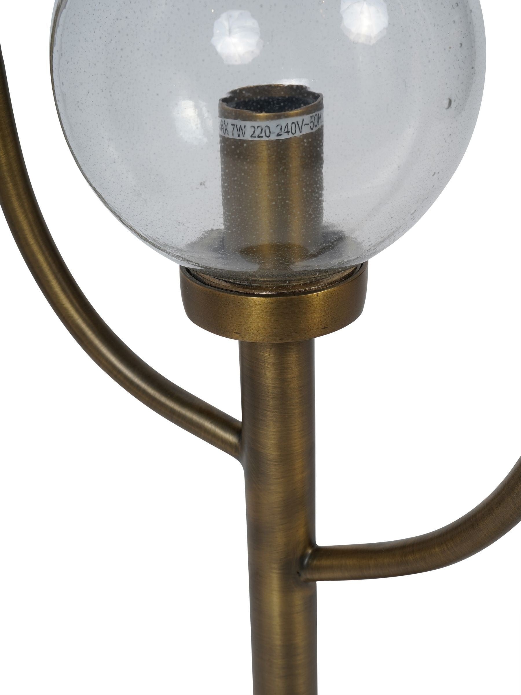 Libra Interiors antique brass three globe table lamp (British brand)