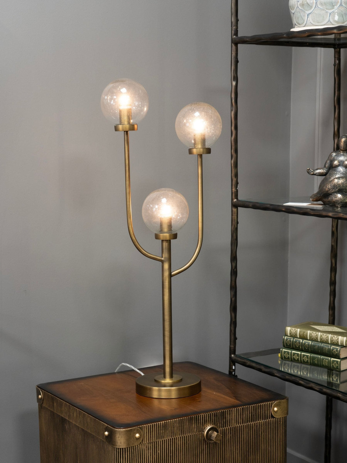Libra Interiors antique brass three globe table lamp (British brand)