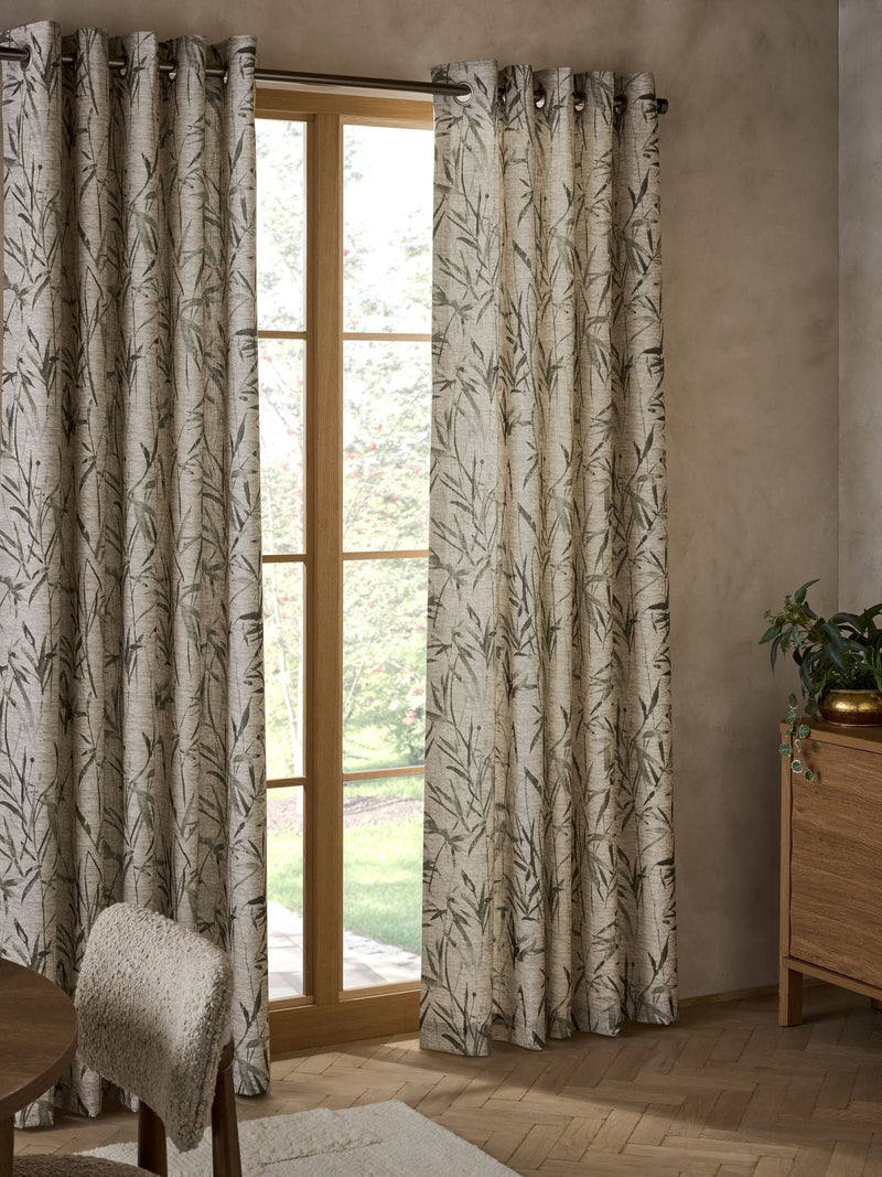 Curtains with blurred leaf print eyelet in olive green (British brand)
