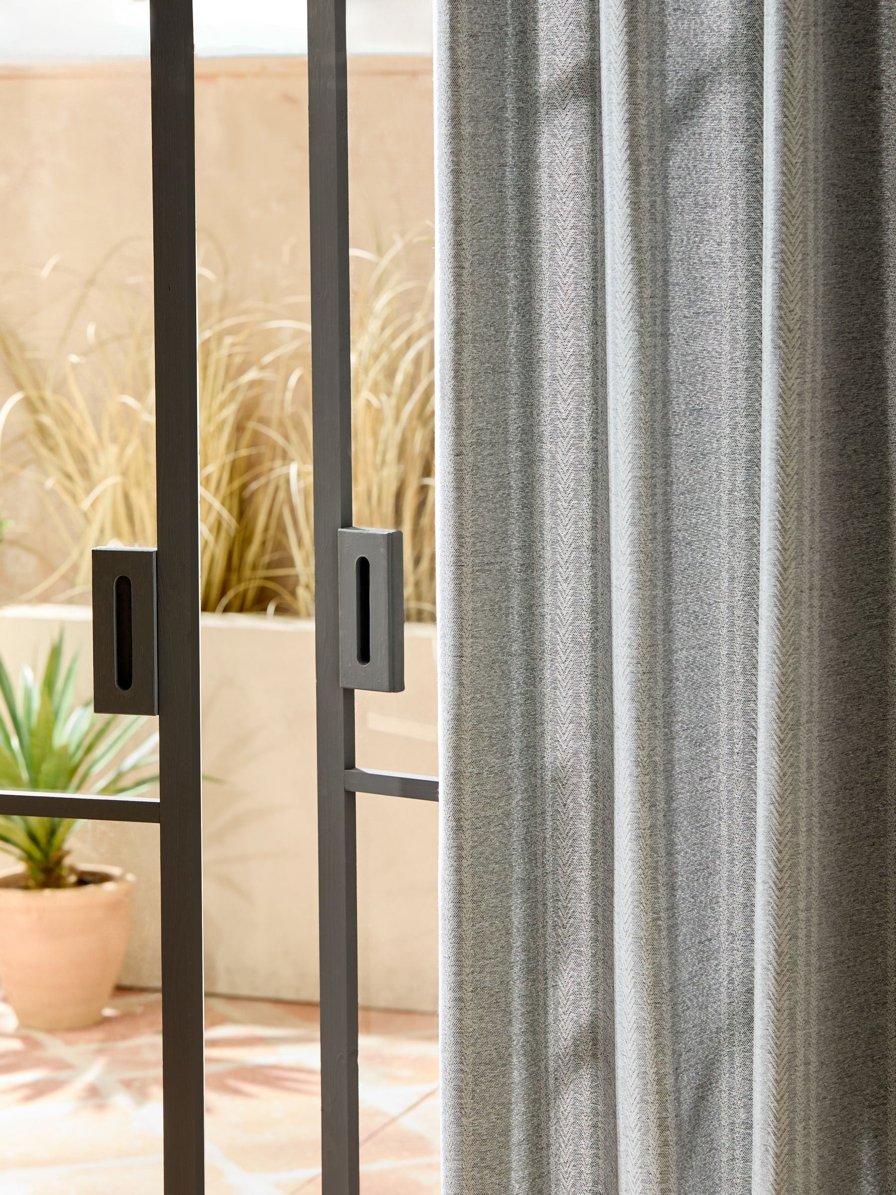 Blue woven stripe eyelet lined curtains, UK version