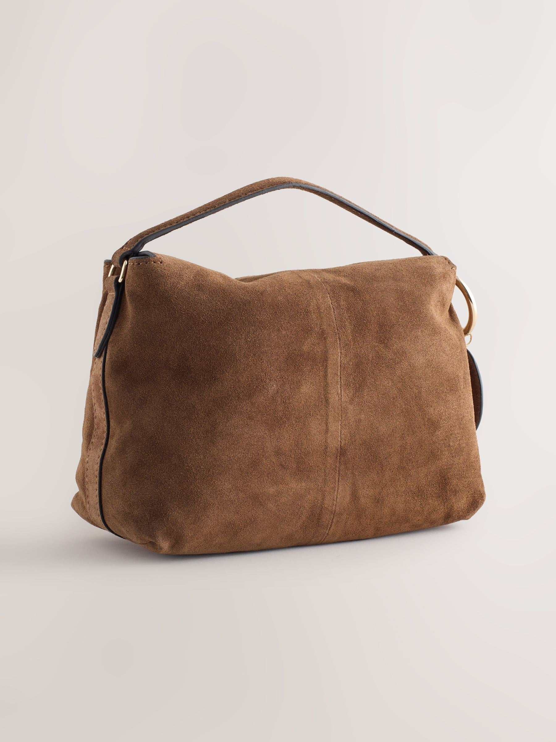 Tan brown leather slouchy cross-body bag with magnetic flap (British brand)