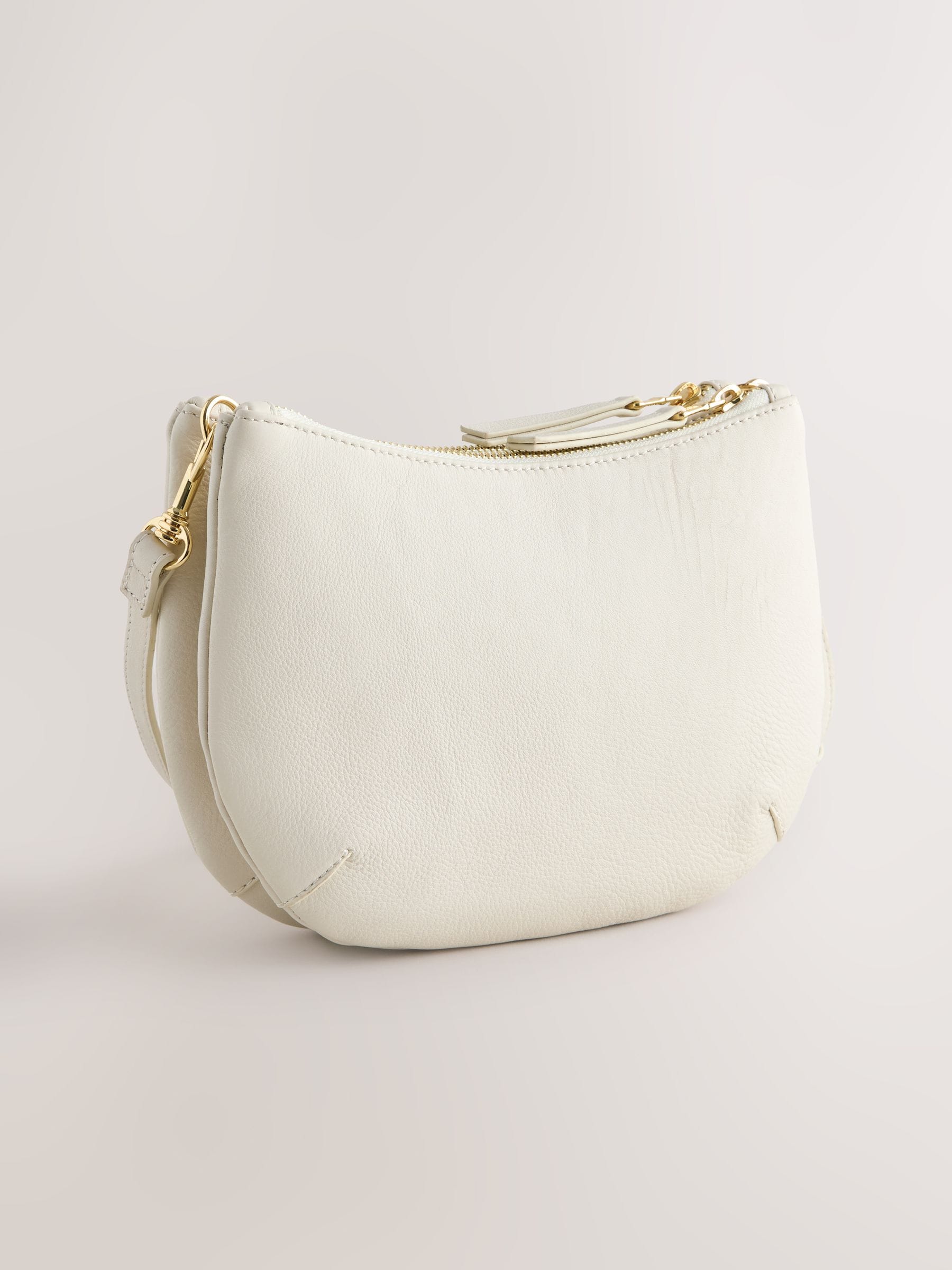 White leather scoop cross-body bag with adjustable strap, UK version