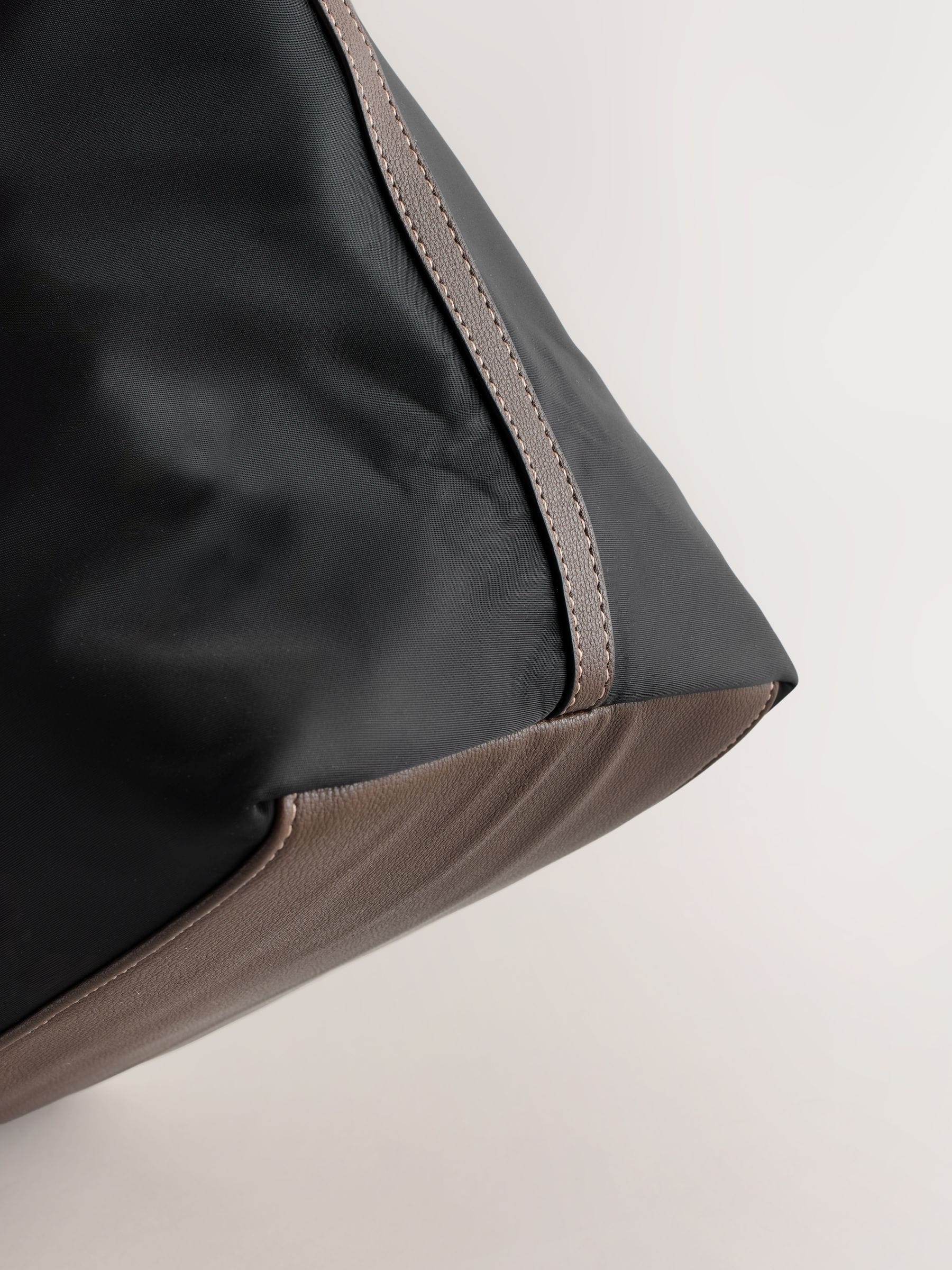 Black nylon shoulder bag with zip pocket, tote style (British brand)