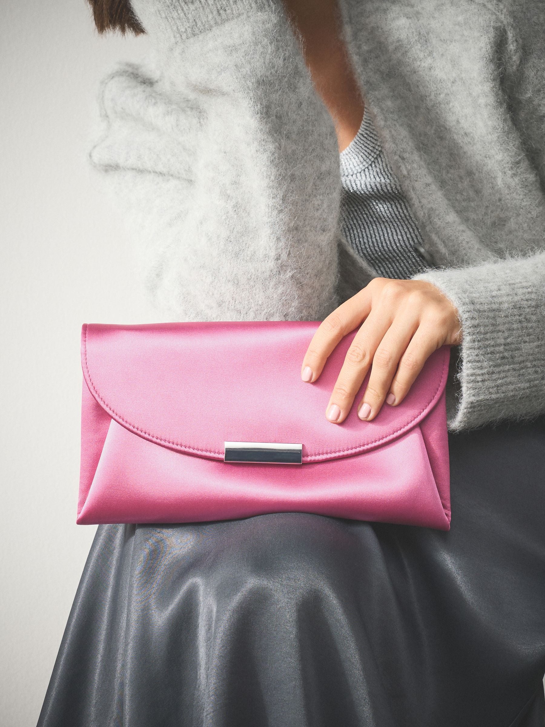 Pink clutch bag with chain strap (British brand)