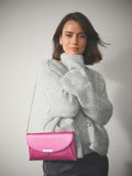 Pink clutch bag with chain strap (British brand)