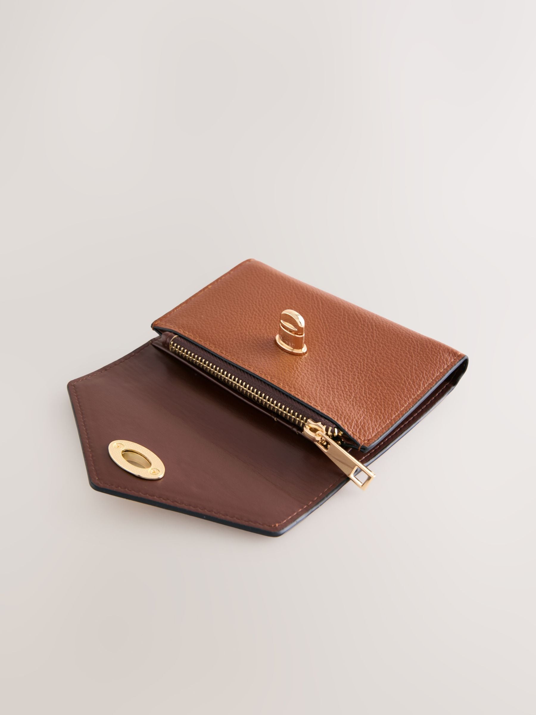 Tan brown envelope lock purse with gold-tone lock (British brand)