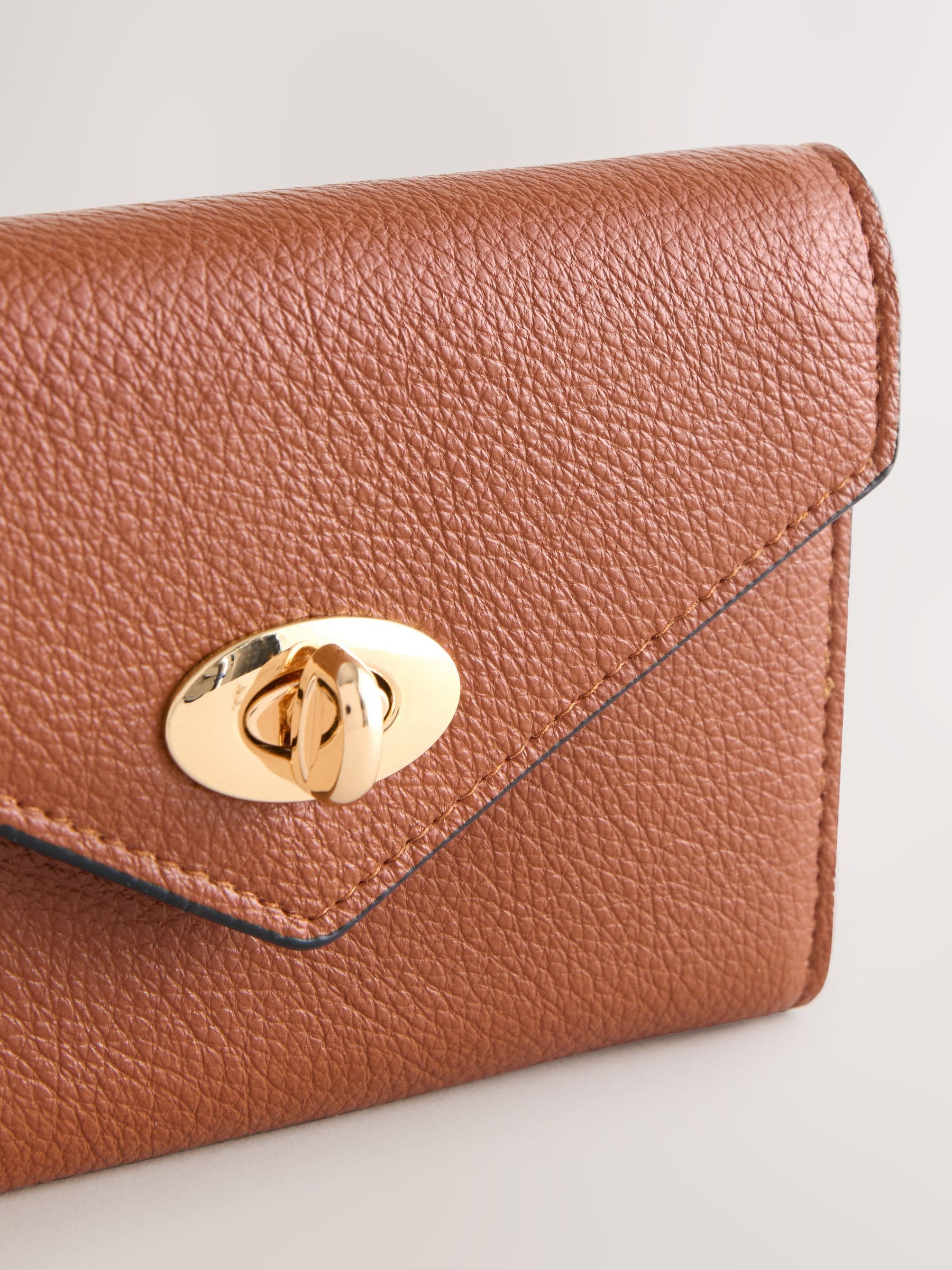 Tan brown envelope lock purse with gold-tone lock (British brand)