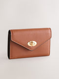 Tan brown envelope lock purse with gold-tone lock (British brand)