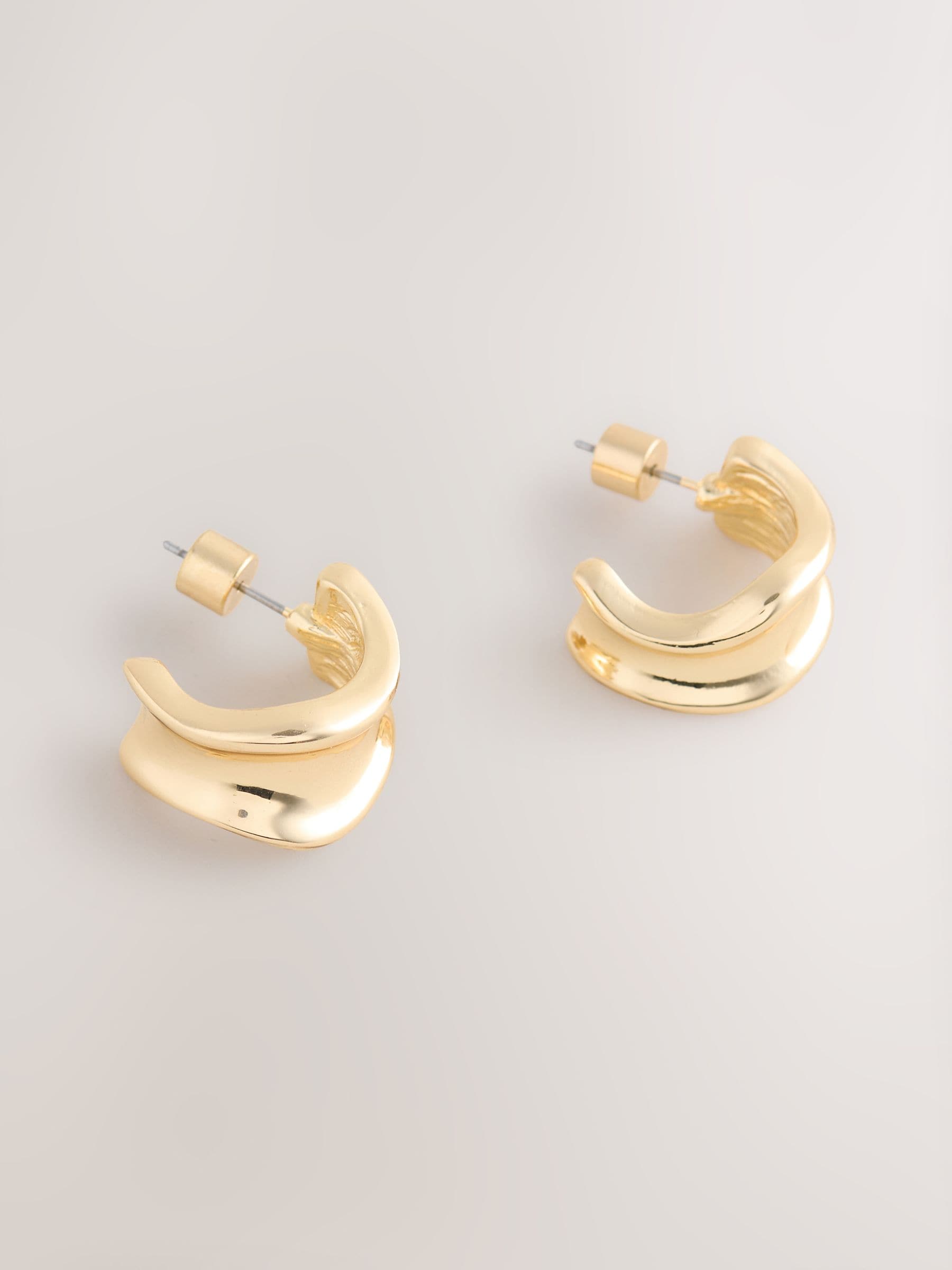 Gold tone wide hoop earrings, UK version