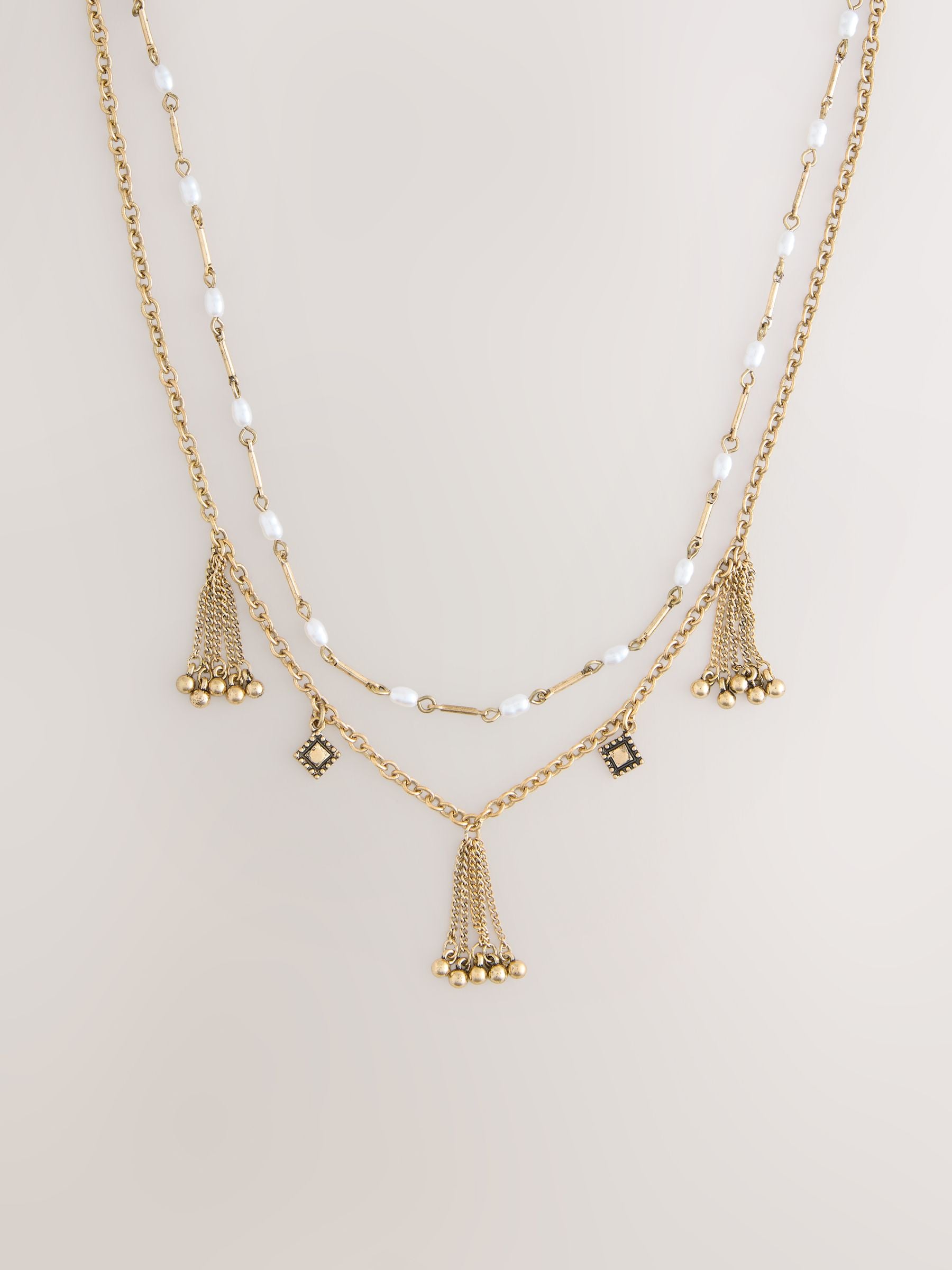 Gold tone tassel chain layered necklace (British brand)