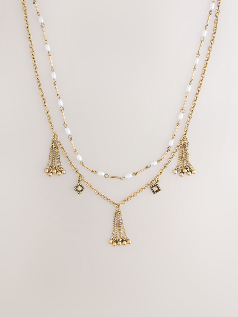 Gold tone tassel chain layered necklace (British brand)