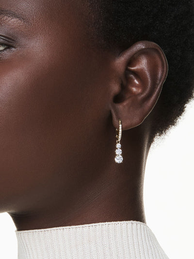 Boucles d'oreilles créoles dorées avec zircons transparents