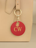 Jonnys Sister faux leather bag charm with gold tone flower, imported from the UK