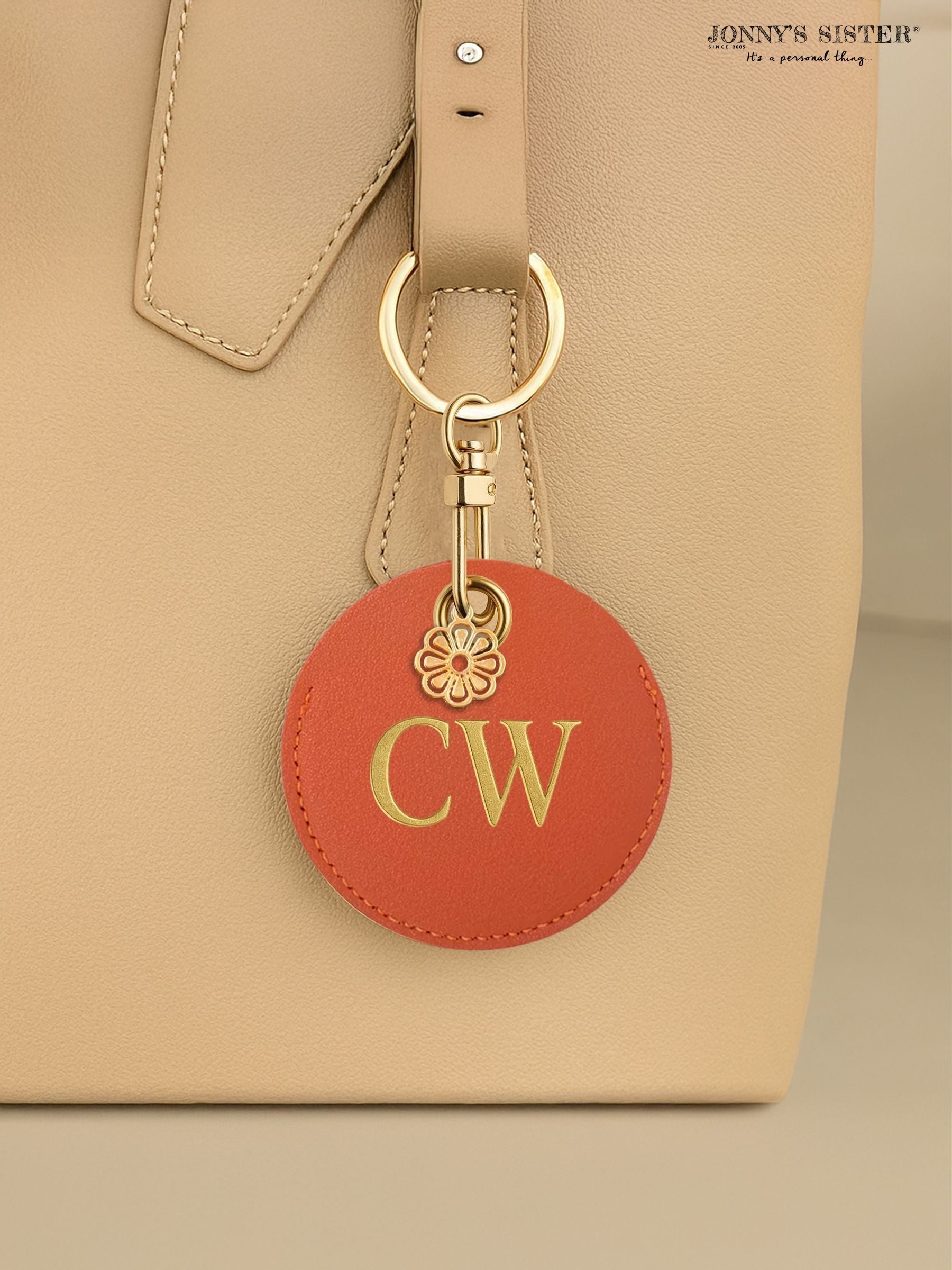 Jonnys Sister faux leather bag charm personalised gold flower, imported from the UK