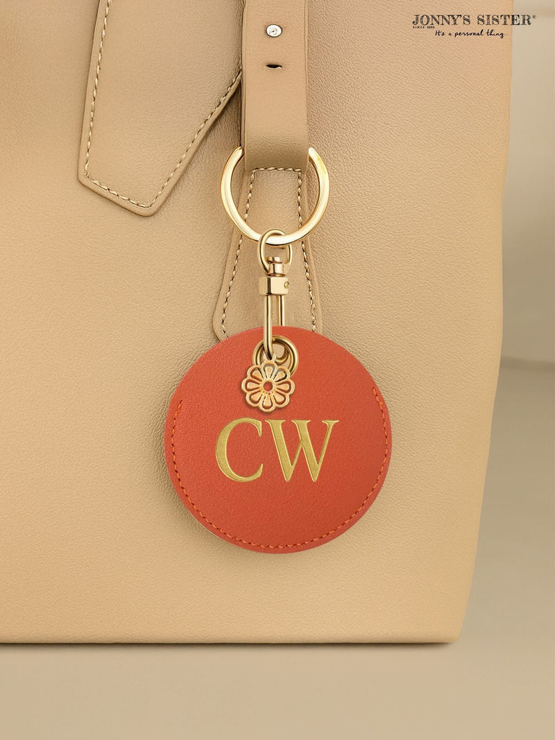 Jonnys Sister faux leather bag charm personalised gold flower, imported from the UK