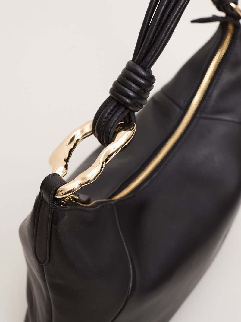 Phase Eight black shoulder bag with twisted handle, UK version