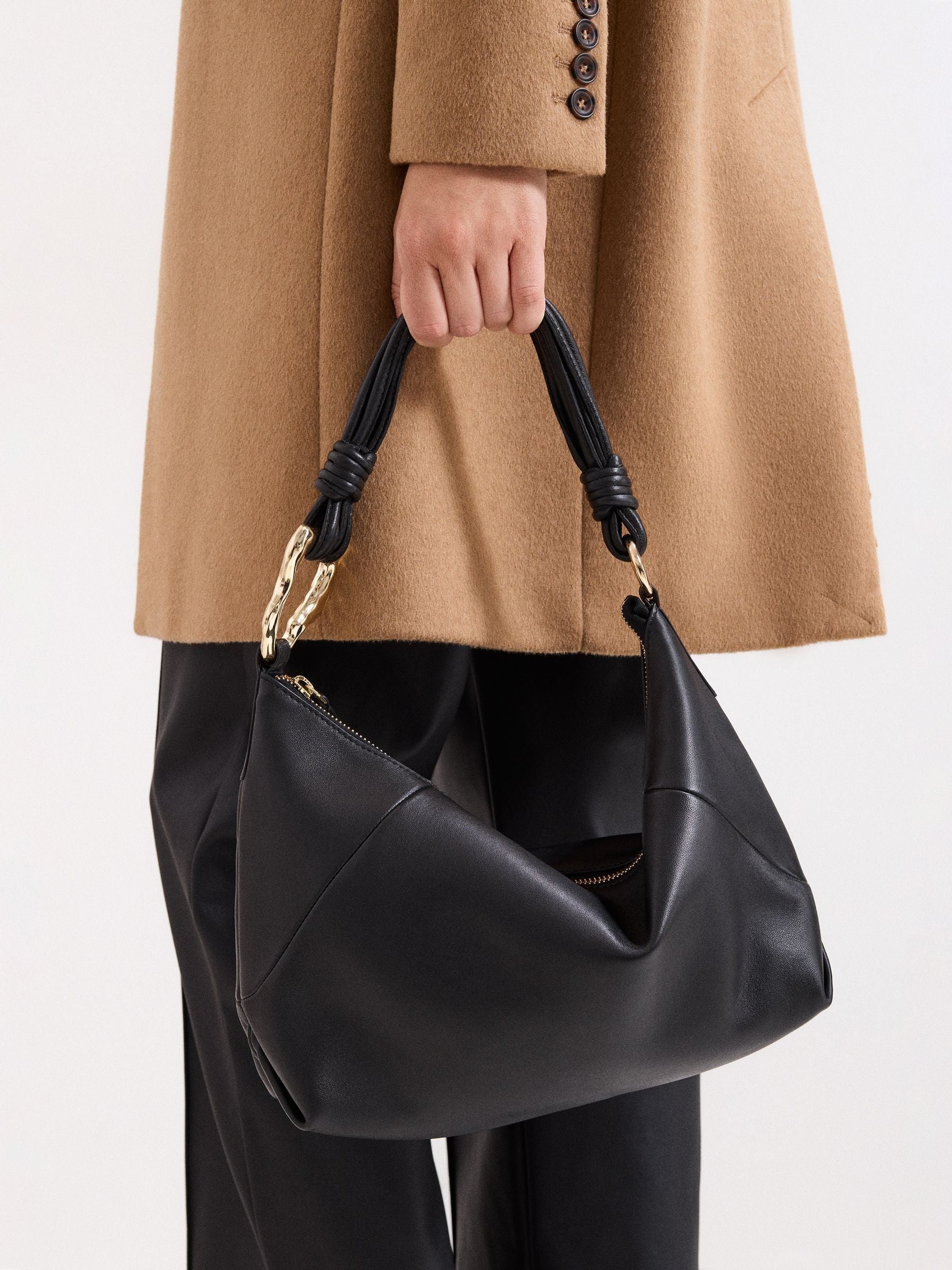 Phase Eight black shoulder bag with twisted handle, UK version