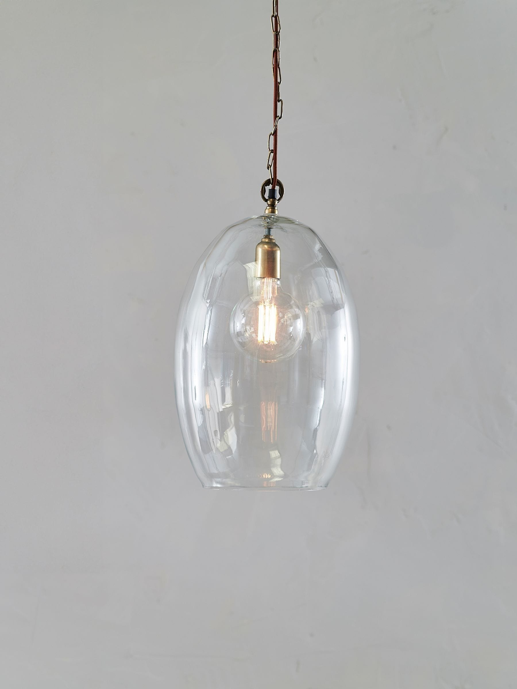 Nkuku Otoro clear glass pendant light - British product