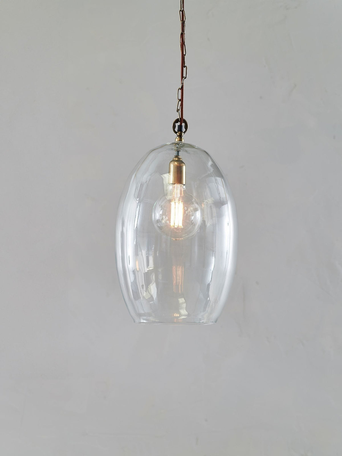 Nkuku Otoro clear glass pendant light - British product